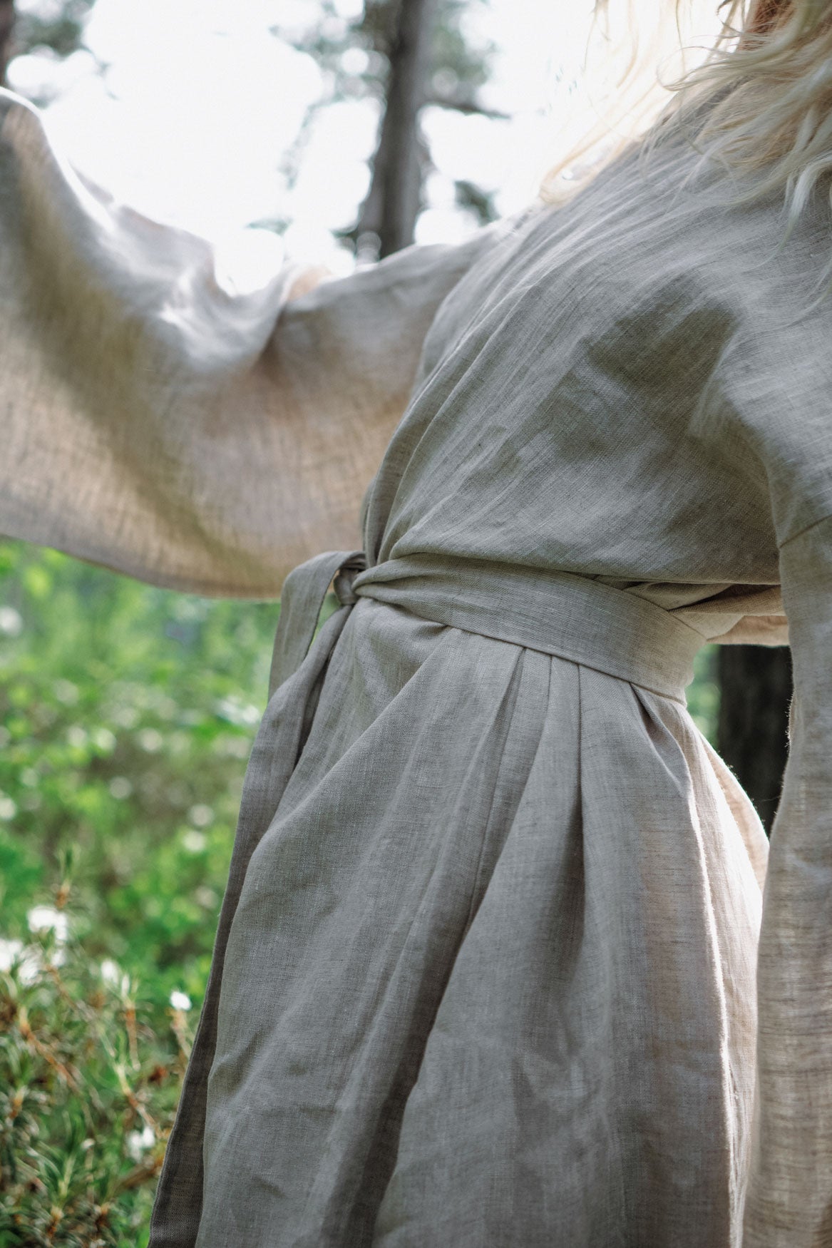 Organic, sustainable and sexy at the same time! Agasåga long beige kimono with splits, long sleeves and belt. Below knee length bathrobe. This robe is natural, soft, breathable and pure. It’s a conscious and healthy choice for your body and environment that embraces genuine selflove and selfcare. Handmade with love in the North.