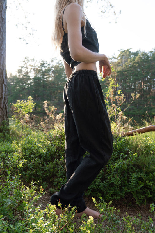Organic, sustainable black linen pants and top that can be worn as a loungewear, pajamas or sweatpants with a top. These pants are natural, comfortable, soft and pure. These pants are a conscious and healthy choice for your body and environment. Handmade in the North.