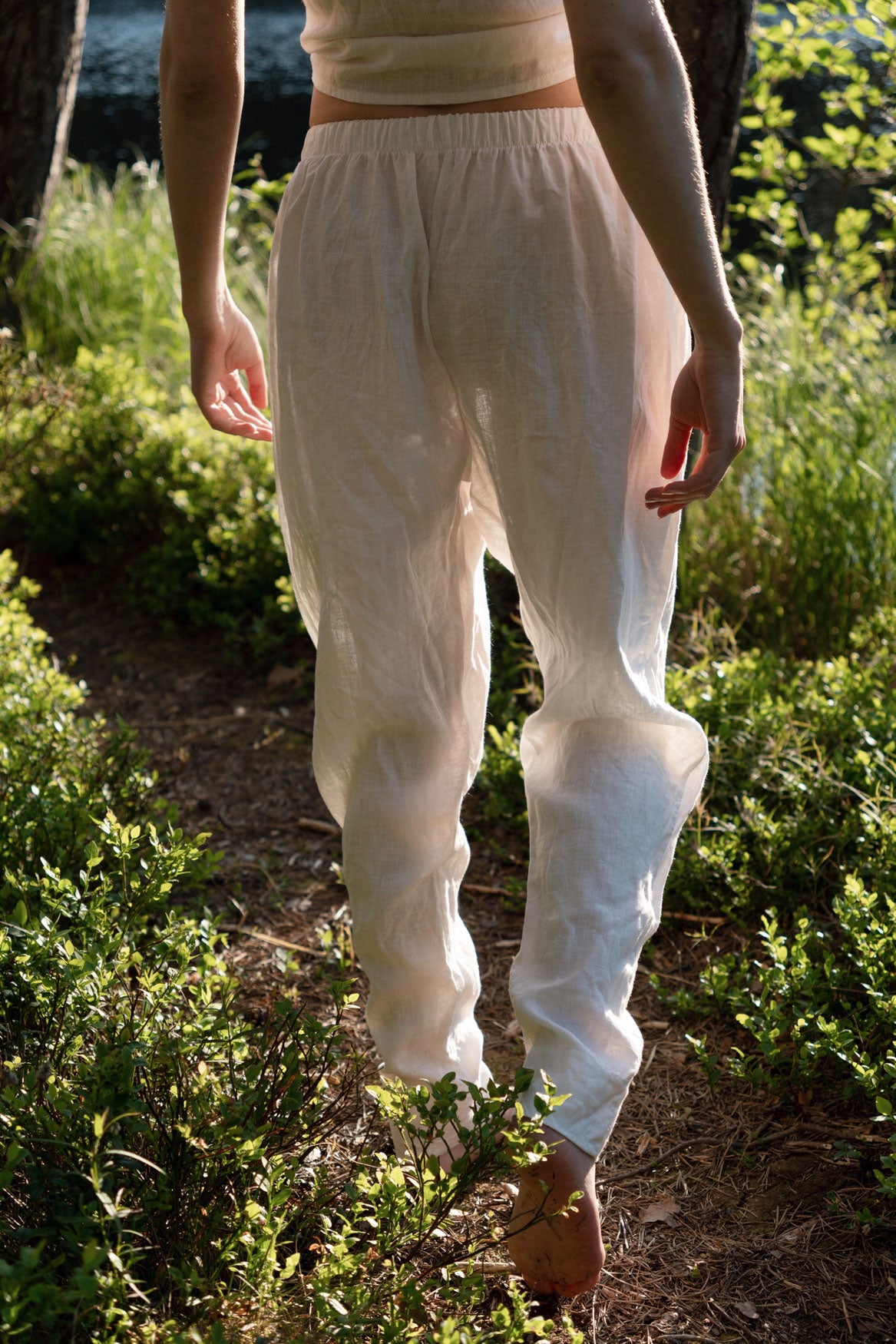 Organic, sustainable white linen pants and top that can be worn as a loungewear, pajamas or sweatpants with a top. These pants are natural, comfortable, soft and pure. These pants are a conscious and healthy choice for your body and environment. Handmade in the North.