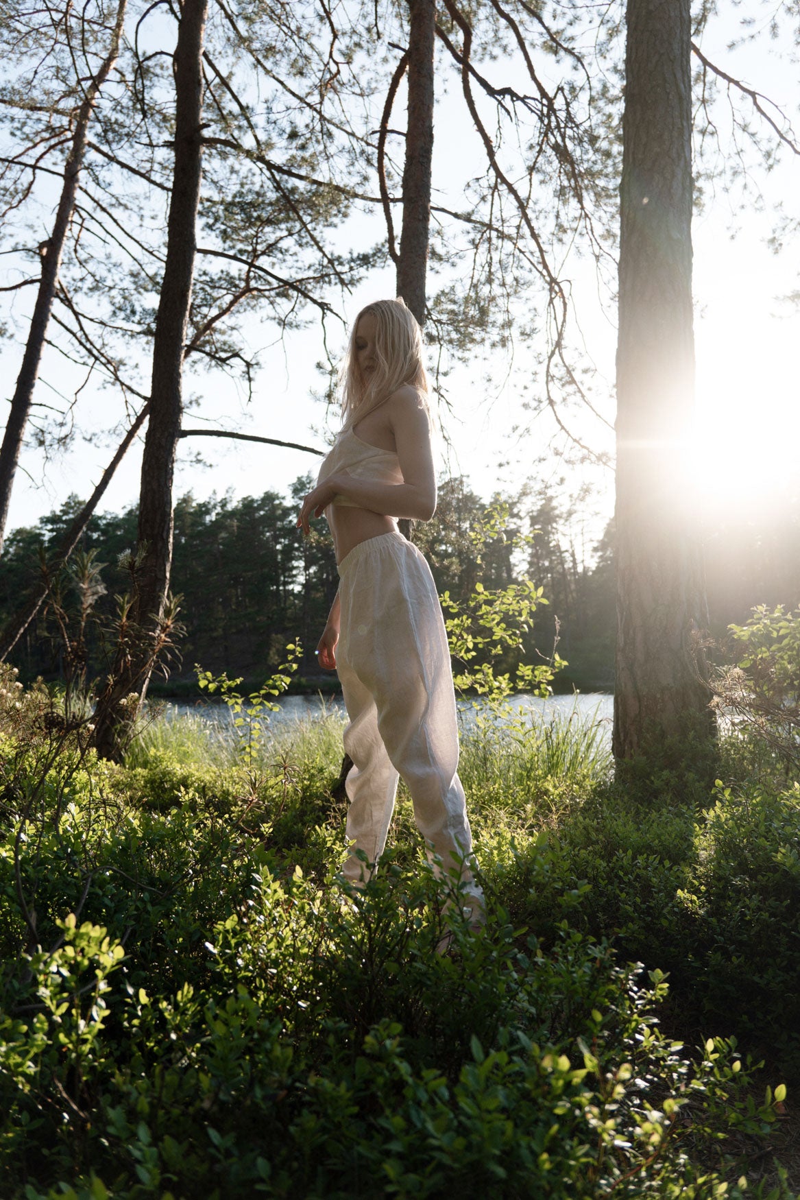 Organic, sustainable white linen pants and top that can be worn as a loungewear, pajamas or sweatpants with a top. These pants are natural, comfortable, soft and pure. These pants are a conscious and healthy choice for your body and environment. Handmade in the North.