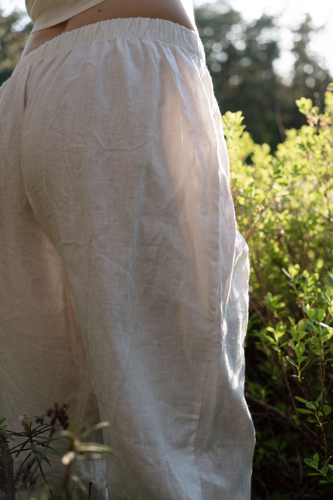 Organic, sustainable white linen pants and top that can be worn as a loungewear, pajamas or sweatpants with a top. These pants are natural, comfortable, soft and pure. These pants are a conscious and healthy choice for your body and environment. Handmade in the North.