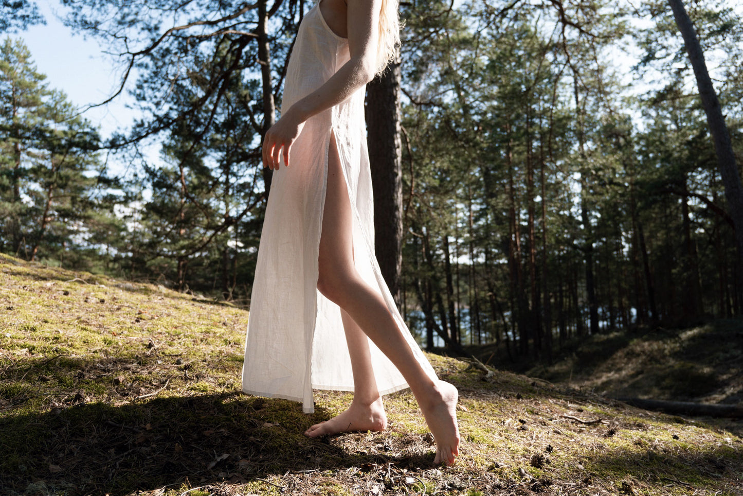 Organic, sustainable, sexy, long white linen nightwear slip dress with spaghetti straps and splits. This linen lingerie nightdress is natural, comfortable, soft and pure. This sleepwear nightgown is a conscious and healthy choice for your body and environment.