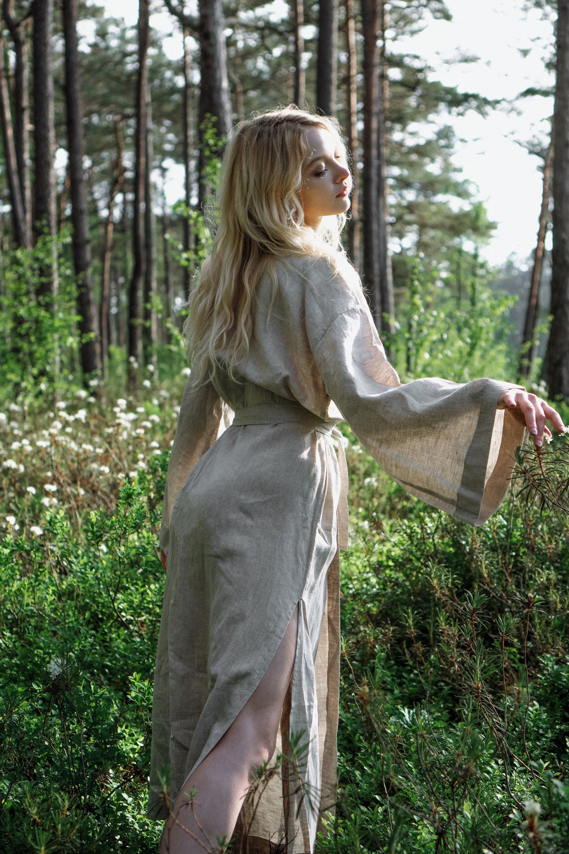 Organic, sustainable and sexy at the same time! Agasåga long beige kimono with splits, long sleeves and belt. Below knee length bathrobe. This robe is natural, soft, breathable and pure. It’s a conscious and healthy choice for your body and environment that embraces genuine selflove and selfcare. Handmade with love in the North.