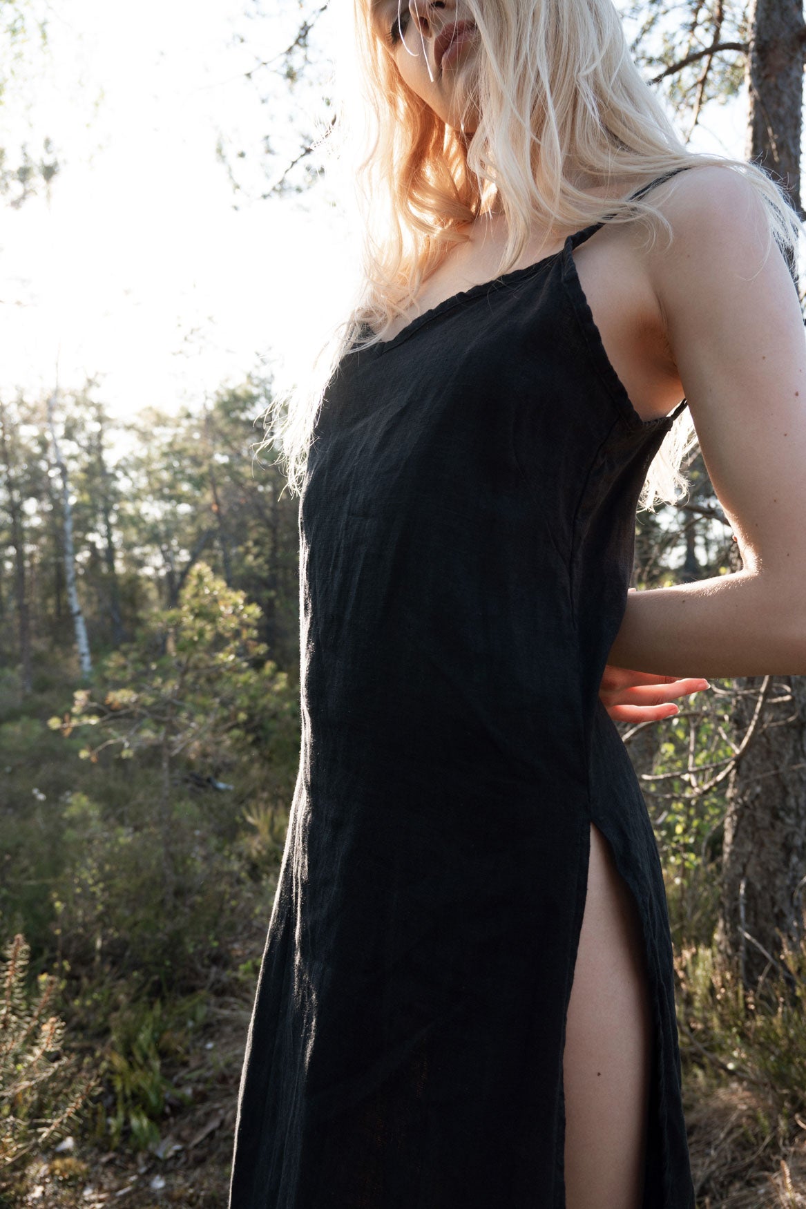 Organic, sustainable, sexy, long black linen nightwear slip dress with spaghetti straps and splits. This linen lingerie nightdress is natural, comfortable, soft and pure. This sleepwear nightgown is a conscious and healthy choice for your body and environment.