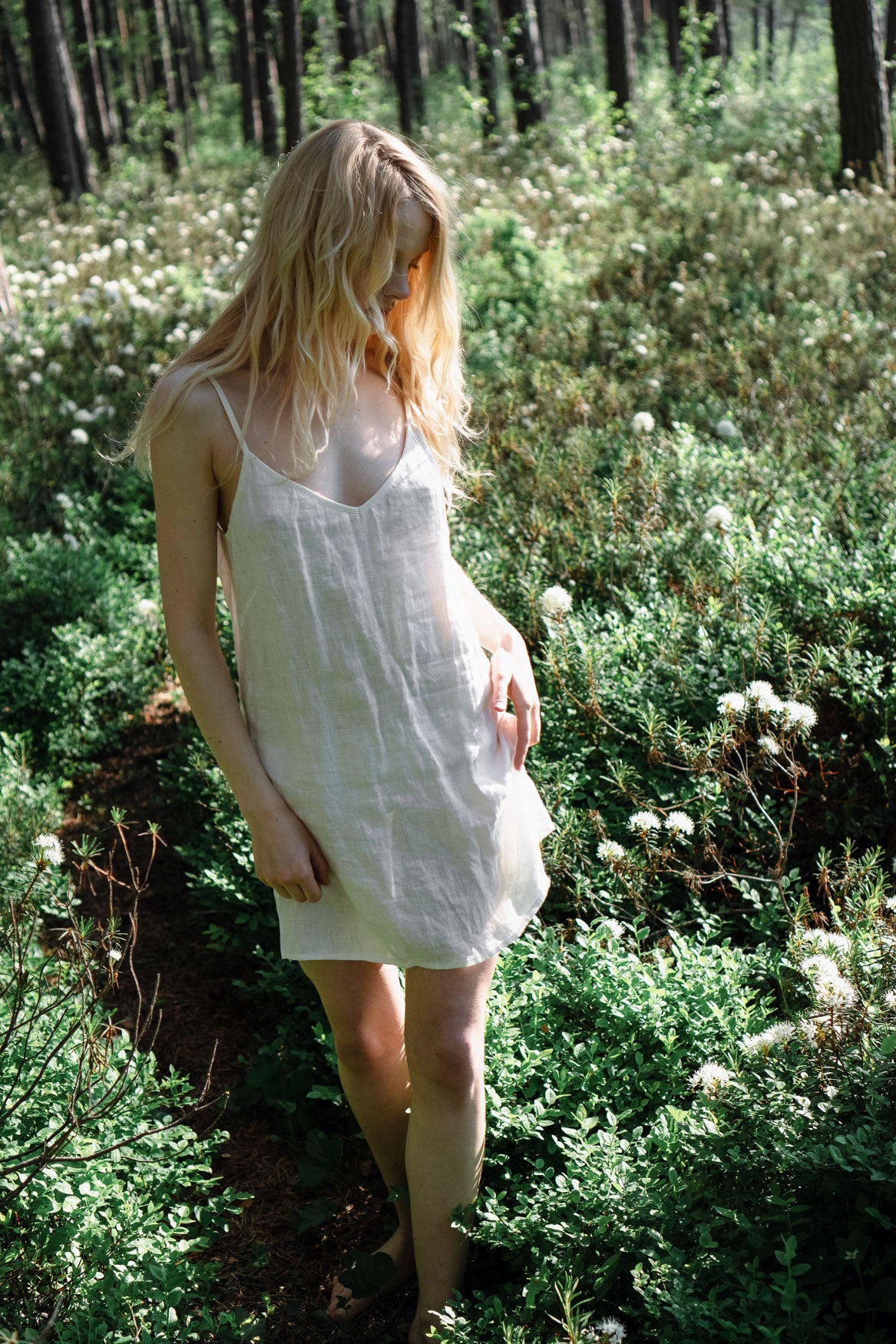 Organic, sustainable and sexy at the same time! Agasåga white short natural linen slip dress, nightdress with straps. This sleepwear is natural, soft, breathable and pure. It’s a conscious and healthy choice for your body and environment that embraces genuine selflove and selfcare. Handmade with love in the North.