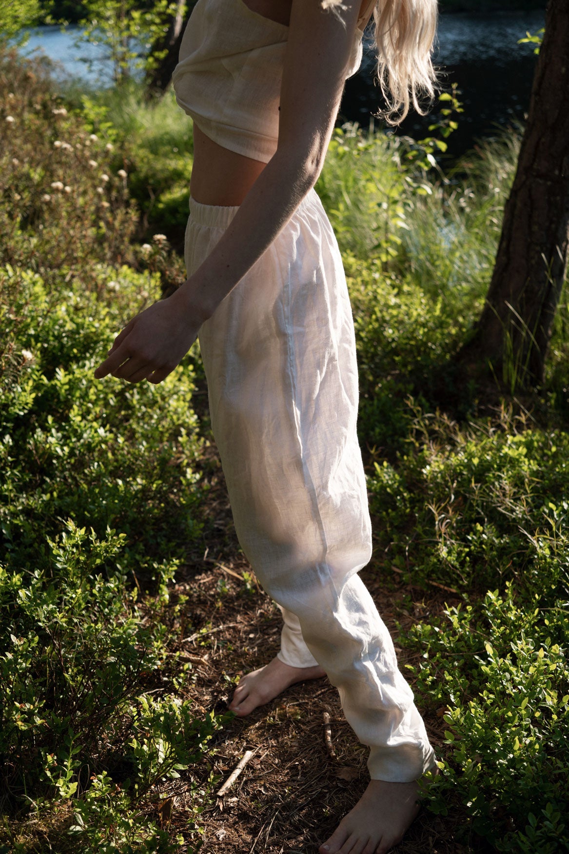 Organic, sustainable white linen pants and top that can be worn as a loungewear, pajamas or sweatpants with a top. These pants are natural, comfortable, soft and pure. These pants are a conscious and healthy choice for your body and environment. Handmade in the North.