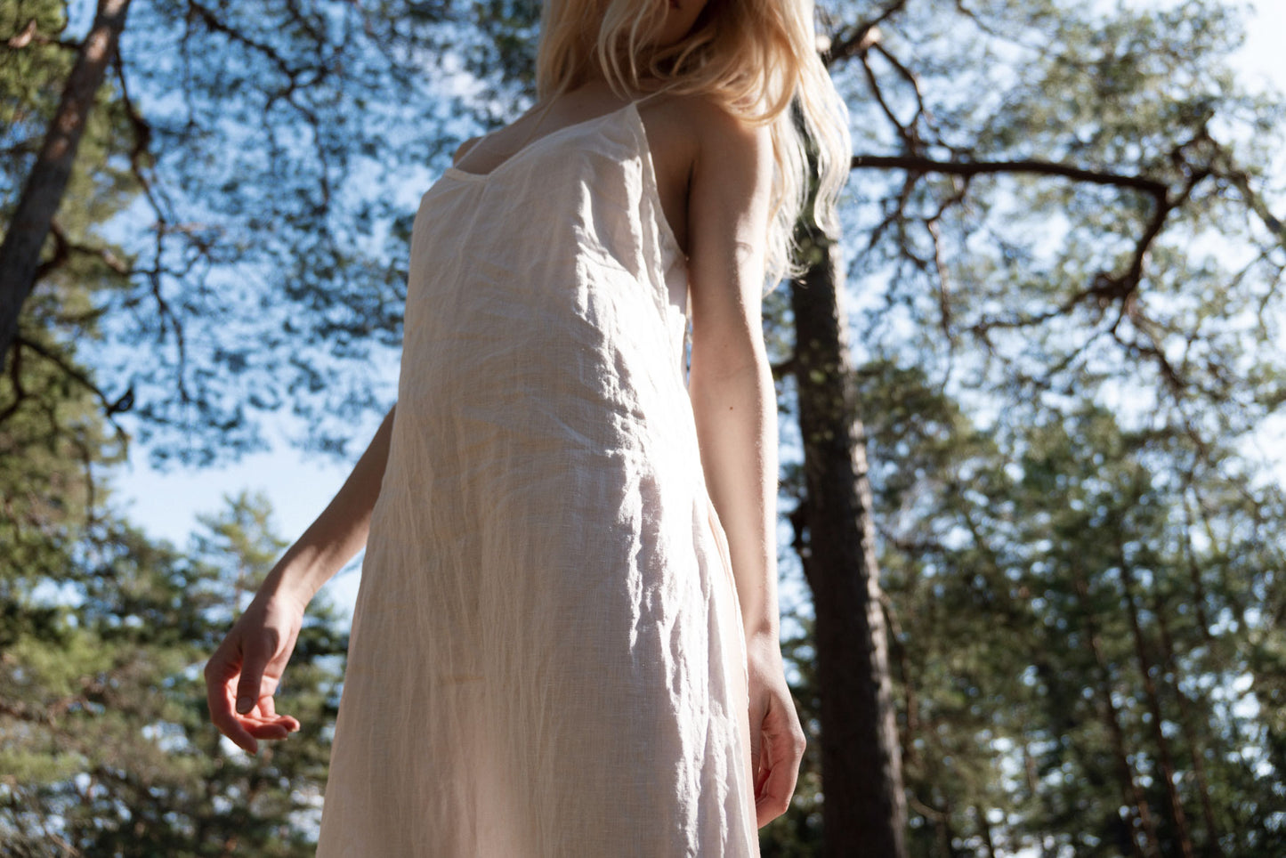 Organic, sustainable, sexy, long white linen nightwear slip dress with spaghetti straps and splits. This linen lingerie nightdress is natural, comfortable, soft and pure. This sleepwear nightgown is a conscious and healthy choice for your body and environment.